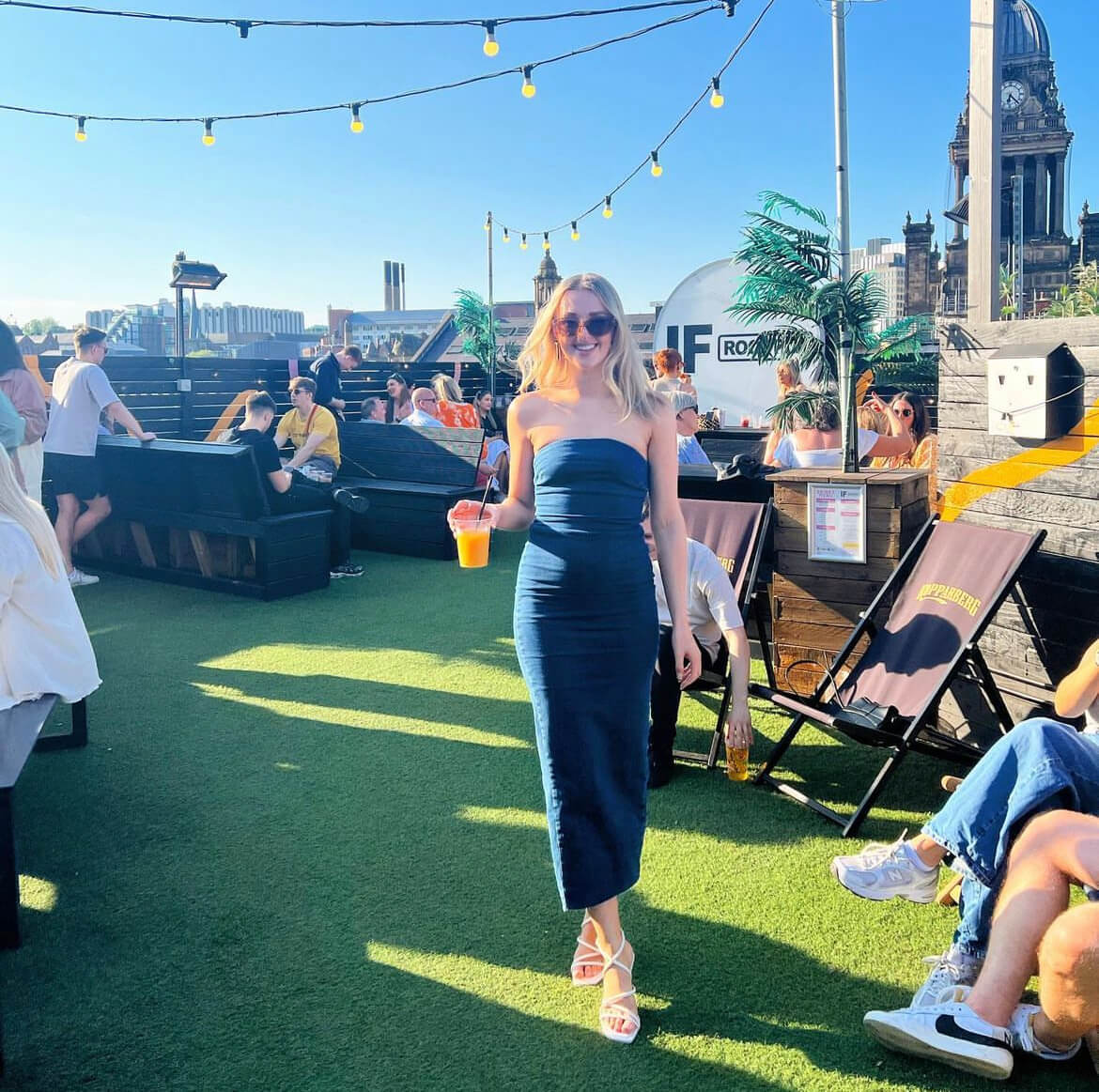 Women standing on IF Rooftop